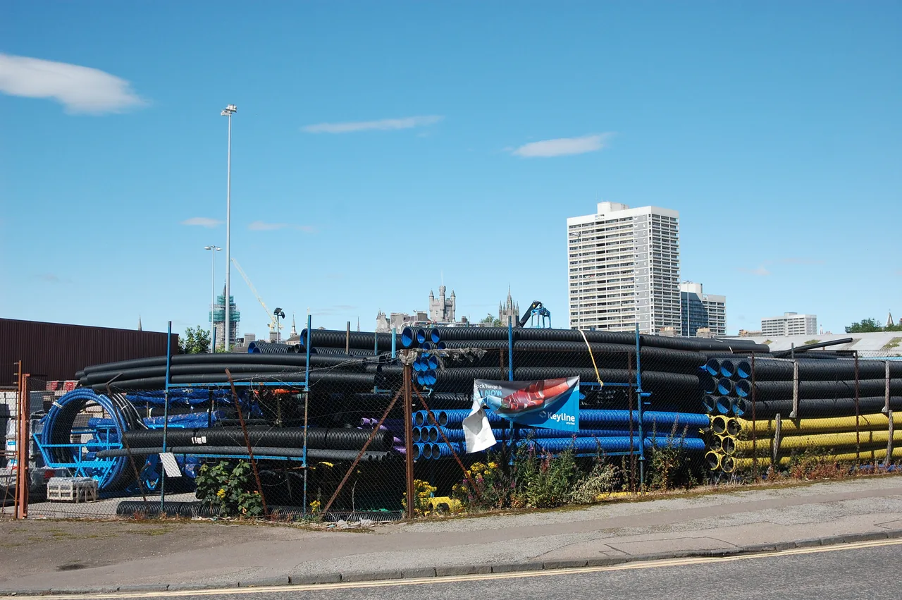 Large-diameter line pipes stacked in a pipe storage yard